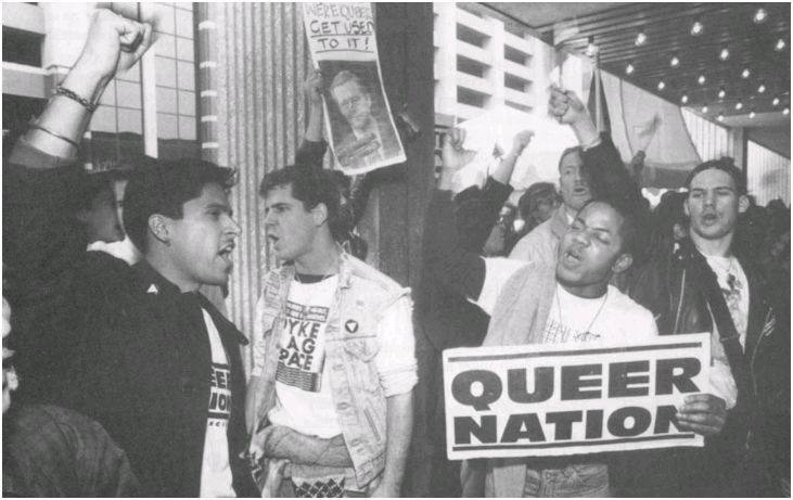 A QUEER NATION PROTEST, FEATURING THE FAMOUS SLOGAN