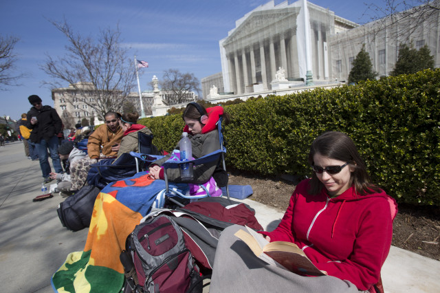 friend of autostraddle Jessica Skrebes waits in line outside the court (credit AP Photo/Jacquelyn Martin)