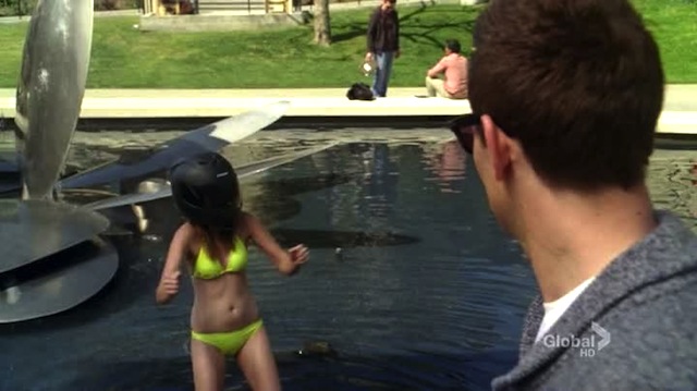 only moments later, this girl will fall backwards into that pool and then feel really happy about wearing a helmet