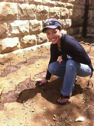 Ciera planting a taro patch