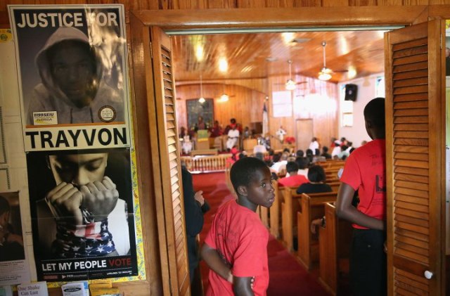 "Parishioners attend Sunday service at Allen Chapel AME church in the historic black neighborhood of Goldsboro on July 14, 2013 in Sanford, Fla."  (Photo by Scott Olson/Getty Images)