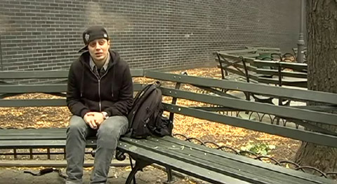 Tiffany "Life" Cocco on a bench that she slept on after becoming homeless. Image via "A Day In Our Shoes," a short film about the LGBT homeless youth.