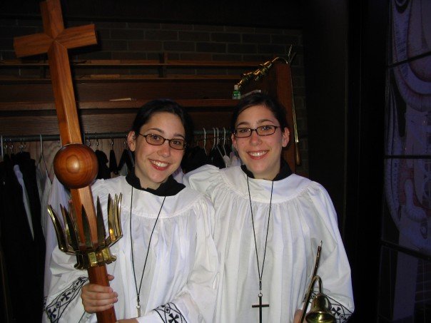 Mandi (left), serving as an acolyte with her twin, Katie