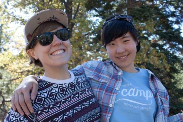 Hannah and Hannah in matching floral print hats at A-Camp in October, 2013.
