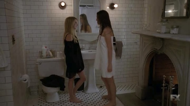 I know some hot girl on girl action is afoot, but that bathroom has a fireplace! Jealous.
