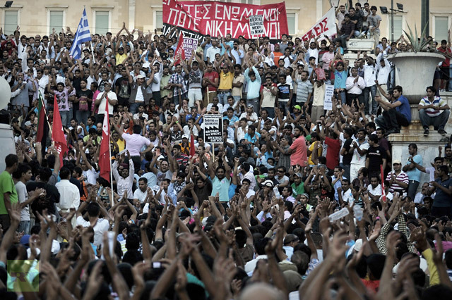 Migrants protest attacks on immigrants by ultra nationalist groups and police operations in Greece, 2012 via Louisa Gouliamaki / RT