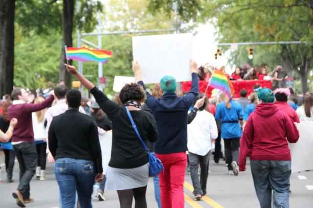 Students from Alabama's LGBTQ+ student group Spectrum infiltrating the University of Alabama Homecoming parade