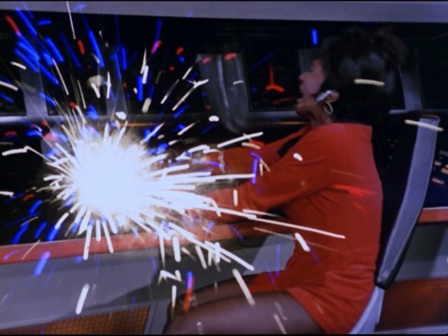 Charlie seizing the ship and shocking Uhura away from her controls.