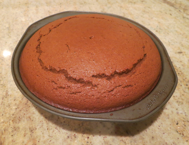 After! (Don't worry about the cracks – when you flip the cake over to get it out of the pan you'll be frosting the BOTTOM so the top literally does not matter at all YAY!)