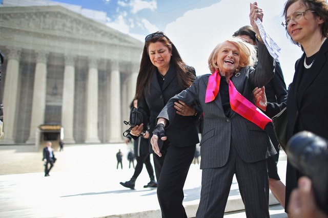 WASHINGTON, DC - MARCH 27: Edith Windsor (C), 83, acknowledges her supporters as she leaves the Supreme Court March 27, 2013 in Washington, DC. The Supreme Court heard oral arguments in the case 'Edith Schlain Windsor, in Her Capacity as Executor of the Estate of Thea Clara Spyer, Petitioner v. United States,' which challenges the constitutionality of the Defense of Marriage Act (DOMA), the second case about same-sex marriage this week. (Photo by Chip Somodevilla/Getty Images)