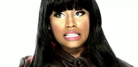 Nicki Minaj mouths "umm" with shifty eyes