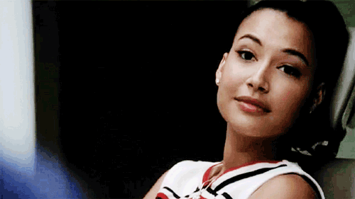 Santana gives a catty smile