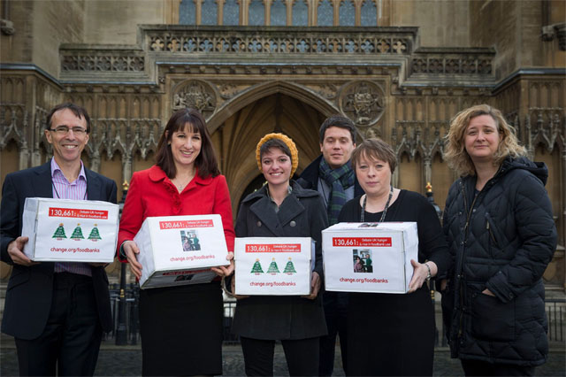 Jack Monroe (centre, in yellow hat) with food bank petition boxes via The Mirror