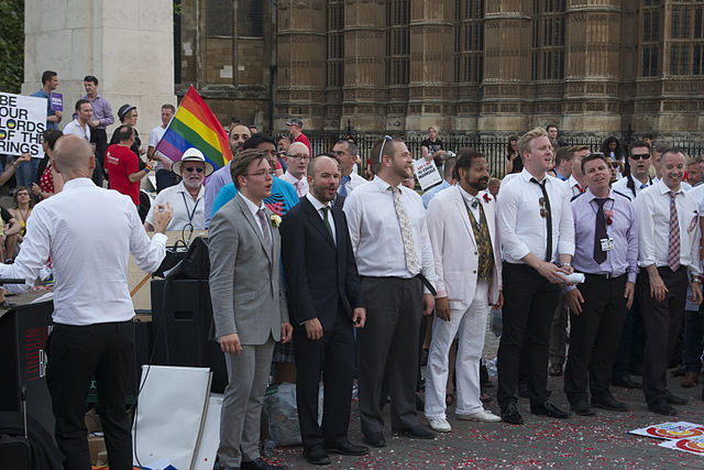 Celebrations outside Westminster Parliament as the marriage bill passed its Third Reading via Wikimedia Commons