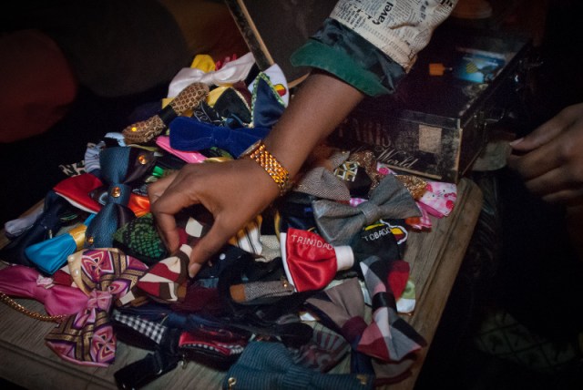 Silki Smooth Harris arranges bowties from her accessories line, Ambiance Couture Bowtie. Copyright Joi Ong.