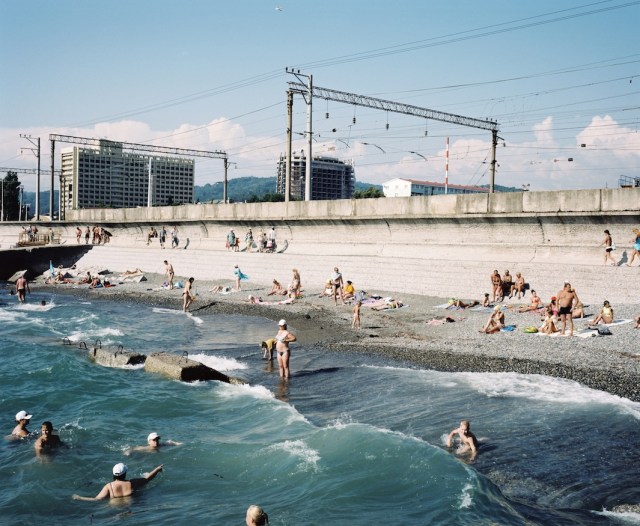 The Railway line passes by a pebble beach popular with Russian tourists. (Rob Hornstra/Flatland Gallery. All images from The Sochi Project: An Atlas of War and Tourism in the Caucasus (Aperture, 2013).)