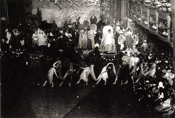 A SCENE FROM THE FUNMAKERS DRAG BALL IN 1940S NYC 