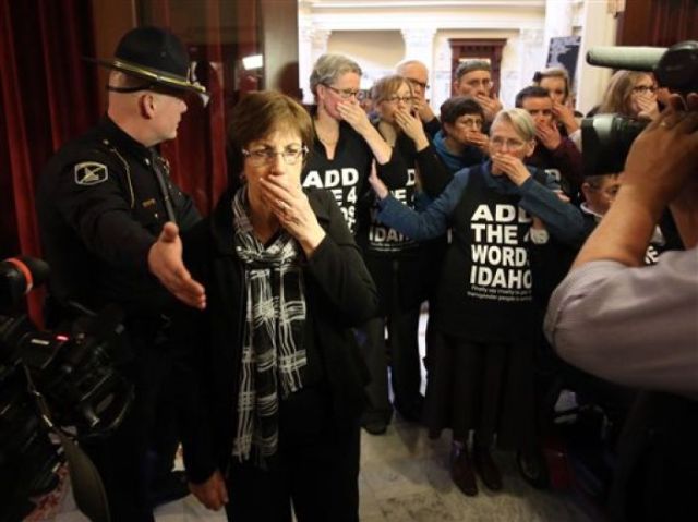 Protesters blocking the entrance to the Senate Chambers in Boise via magicvalley.com