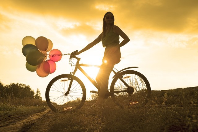 Can't you feel her thrilled trepidation to be riding off into the sunset with those balloons? That is how I feel about most things these days. via Shutterstock