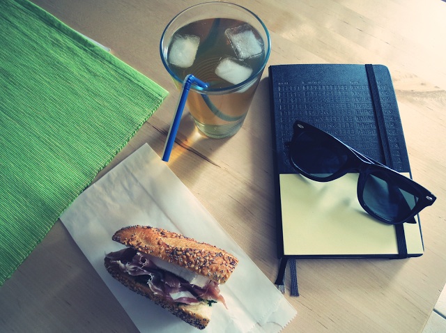 Evidently, no Moleskine is complete without a tinted filter, an artistically posed pair of Ray-Bans, and a tasty-looking sandwich. (Via The Stradivariusisters)