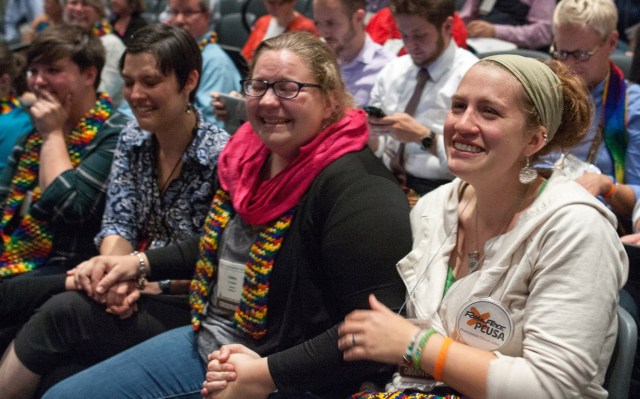 Folks react to the PCUSA vote on Thursday. Photo by Ray Bagnuolo