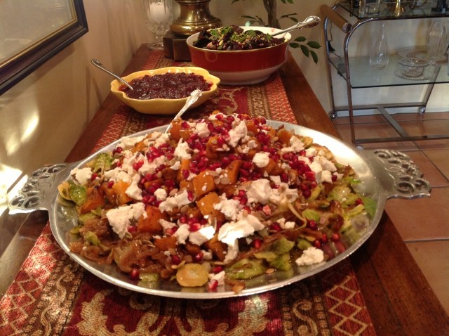 Roasted butternut squash, caramalized onion, goat cheese, and shaved brussels sprouts salad (via sevenspecies.org)