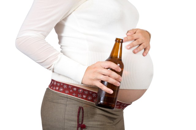 Whether this is a beer belly or a pregnancy belly, concern trolling will not be necessary. Via Sutterstock.