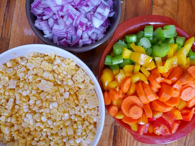 chopped corn, sliced onion, peppers, celery, carrots