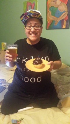 my homegirl and her child just sang me happy berfday and i got a cupcake and a beer!
