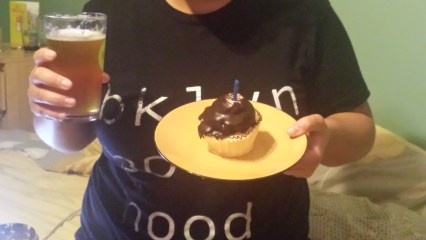 my homegirl and her child just sang me happy berfday and i got a cupcake and a beer!