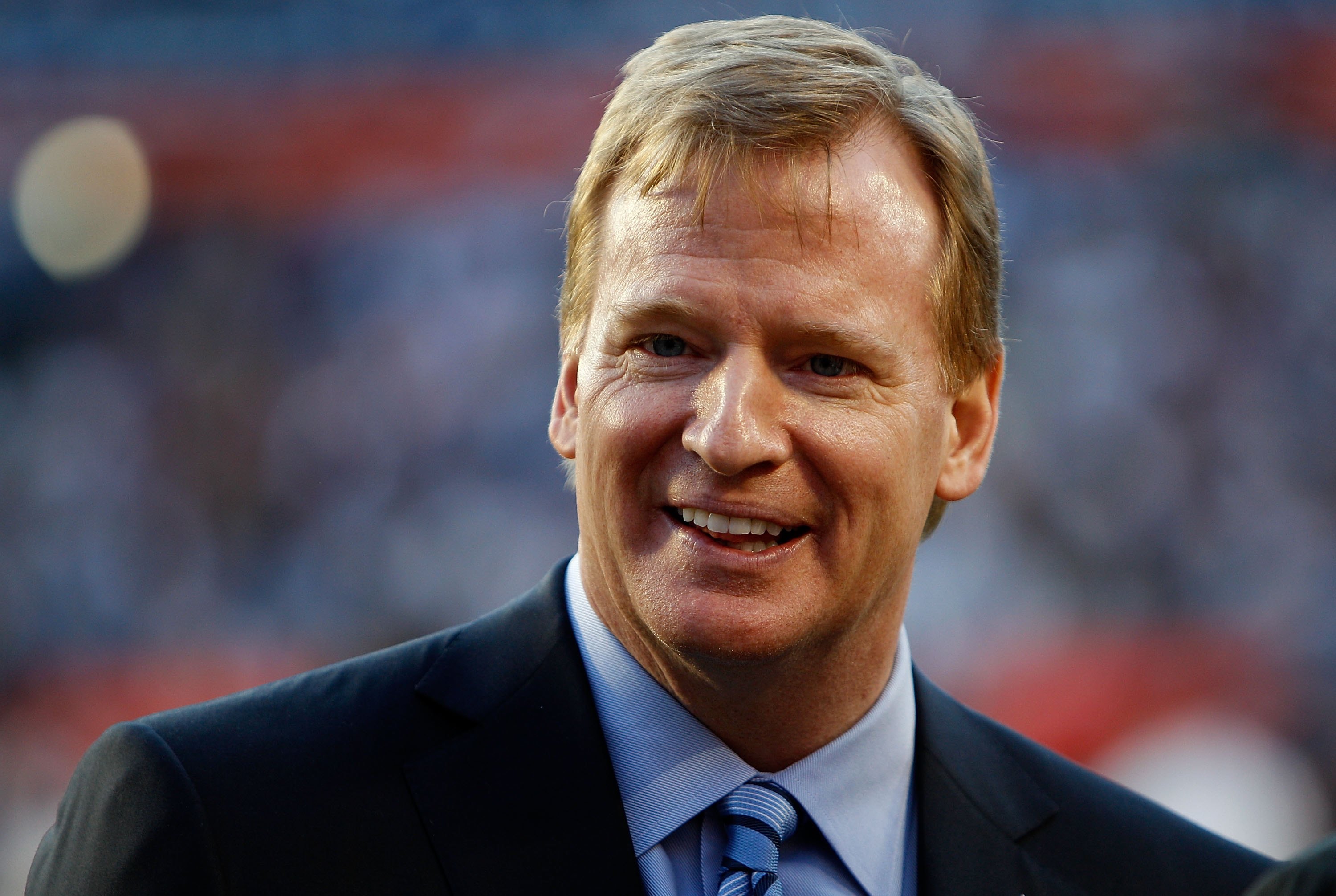 Roger Goodell shimmering with the glow of domestic violence prevention via Modvive