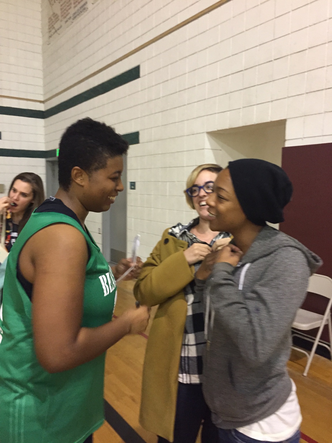 Brittani greets her fans after a basketball game in Los Angeles