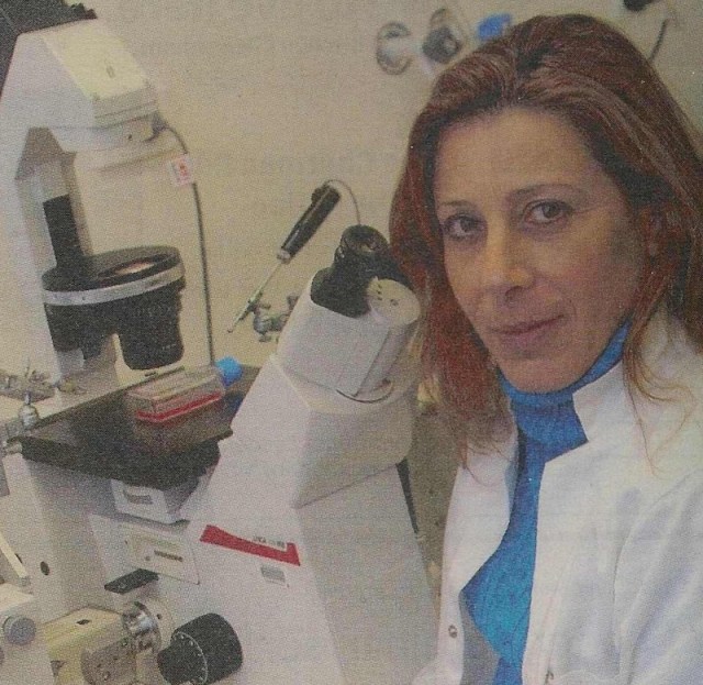 ORLY LACHAM-KAPLAN AT HER MICROSCOPE