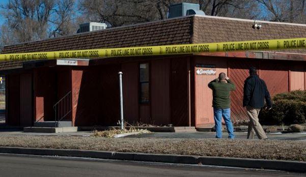 Colorado Springs police investigate the scene of an explosion Tuesday, Jan. 6, 2014, near the Colorado Springs chapter of the NAACP. (The Gazette, Christian Murdock)