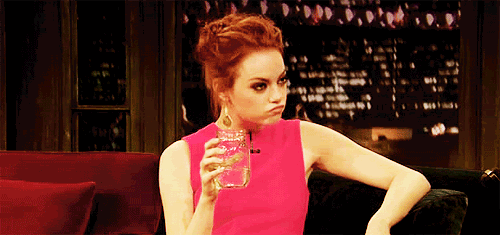Emma-Stone-nodding-with-a-jar-GIF