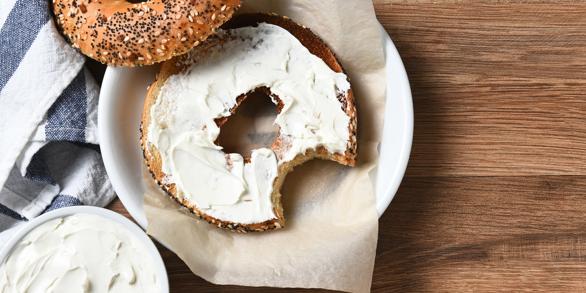 bagel with cream cheese atop it