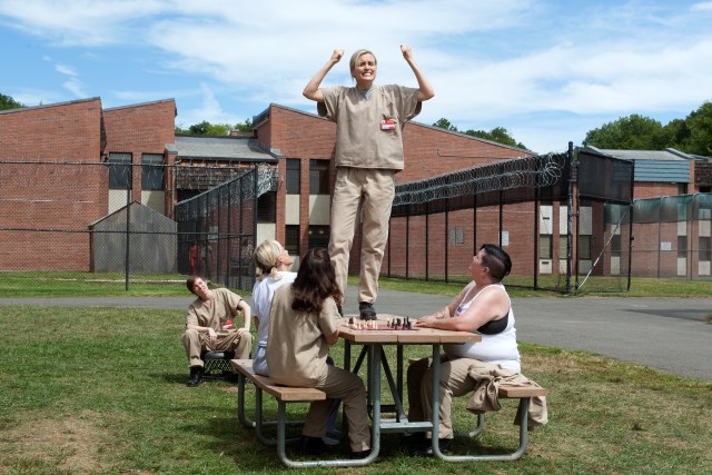 L-R: Yael Stone, Taylor Schilling and Lea DeLaria in season 3 of Netflix's "Orange is the New Black." Photo Credit: JoJo Whilden/Netflix