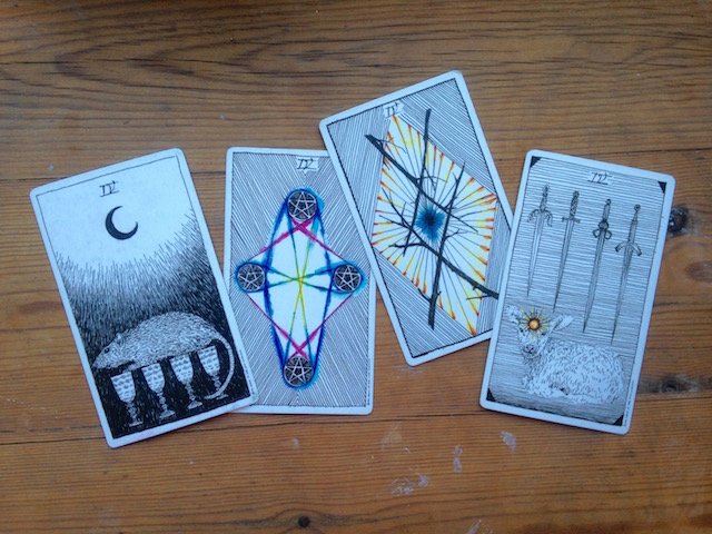 Cards are from The Wild Unknown Tarot by Kim Krans