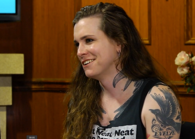 34-year-old lead singer of Against Me! and activist, Laura Jane Grace, looks every bit her age in her cut-up black band tee.