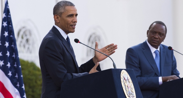 US President Barack Obama (L) and his Kenyan counterpart Uhuru Kenyatta give a joint press conference afteir their talks at the State House in Nairobi on July 25, 2015. In a joint press conference after talks with Kenyan President Uhuru Kenyatta, Obama pushed a tough message on Kenyan corruption, the civil war in South Sudan, controversial elections in Burundi and the fight against Somalia's Al-Qaeda-affiliated Shebab militants.  AFP PHOTO / SAUL LOEB        (Photo credit should read SAUL LOEB/AFP/Getty Images)