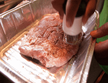 OXO Meat Tenderizer in action. Via Whiskey Bacon.