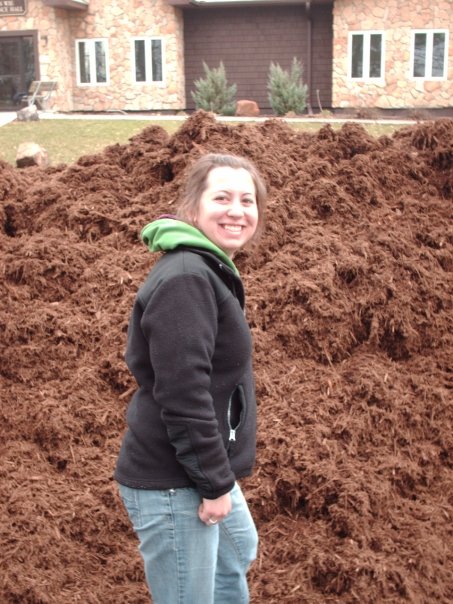 Nikki transferred and made friends while volunteering, and together they moved giant piles of mulch!