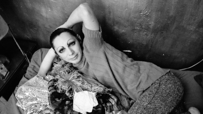 Andy Warhol transvestite Superstar Holly Woodlawn, acclaimed for her performance in 'Trash', photographed in her Greenwich Village apartment in 1970. (Photo by Jack Mitchell/Getty Images)