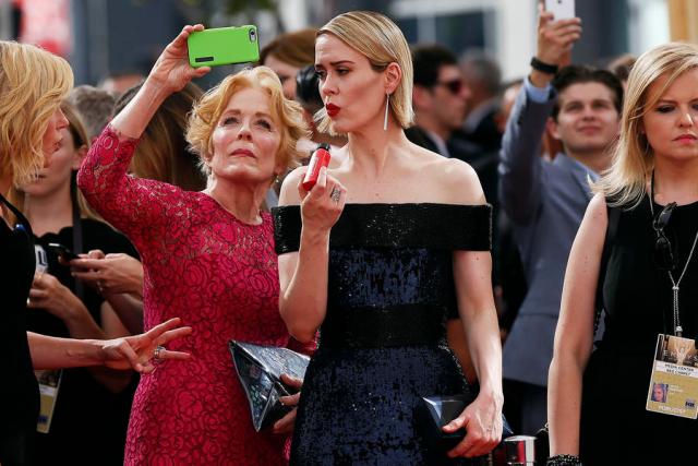 Holland Taylor and Sarah Paulson arrive at the 67th Primetime Emmy Awards in Los Angeles
