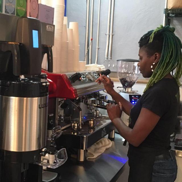 Johnson working in her coffeeshop.