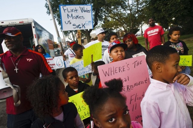 Protestors march along Saginaw Street demanding clean water outside of Flint City Hall in Flint, Mich. on Wednesday Oct. 7, 2015. Christian Randolph | MLive.com.