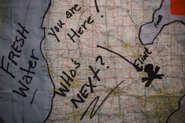 A map previously used during protests against Flint's water quality hangs in the home of area resident Tony Palladeno Jr., 53, on Monday, May 18, 2015 in Flint. Palladeno has been regularly active at protests as well as City Council meetings. Brittany Greeson via MLive.com.