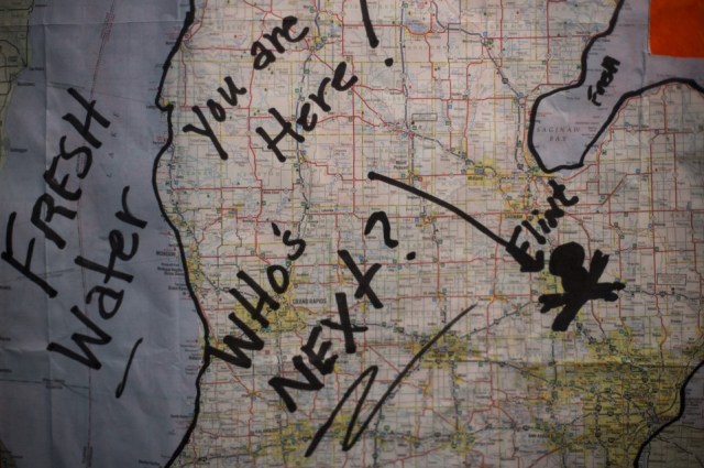 A map previously used during protests against Flint's water quality hangs in the home of area resident Tony Palladeno Jr., 53, on Monday, May 18, 2015 in Flint. Palladeno has been regularly active at protests as well as City Council meetings. Brittany Greeson via MLive.com.