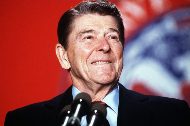 President Ronald Reagan is all smiles during a speech on January 27, 1988. ( Carol Powers / The Washington Times )