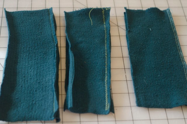 Three different ways to sew knit fabric: from left to right, a straight stitch (not recommended for seams that will need to be stretch out a lot because they may pop open), a zig zag stitch, and a serged seam.